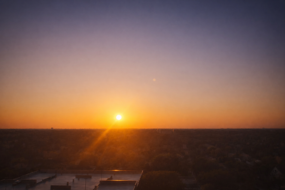 Sunrise over a quiet horizon, reflecting the subtle emotional changes families experience during end-of-life care.